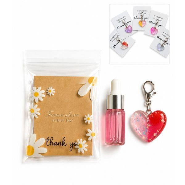 Darilno pakiranje Cuticle Oil Raspberry + obesek za ključe